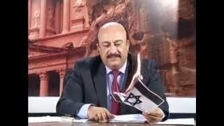 بالفيديو-اعلامي يحرق علم اسرائيل على الهواء مباشرة !