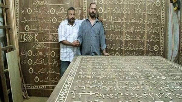 لاجئ سوري في الأردن يستعد لـ "غينيس" بأكبر مصحف قيمته 2 مليون دولار 