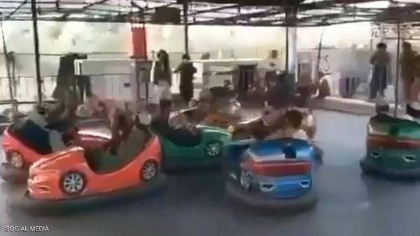 عناصر من طالبان داخل مدينة ملاهي