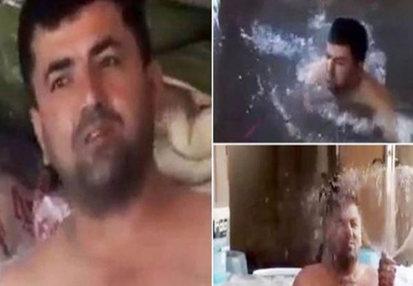 بالفيديو..الحرارة المرتفعة تجبر رجلاً على بناء مسبح داخل منزله