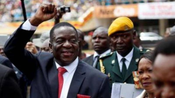 Zimbabwe's president courts white voters ahead of election