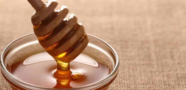 ما فوائد العسل العلاجية؟