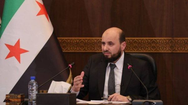 من هو رئيس الحكومة الانتقالية السورية؟