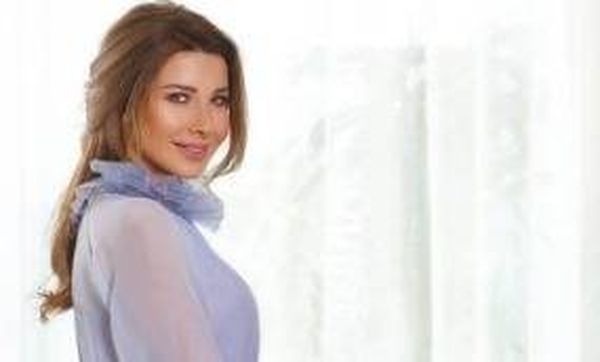 هل أعجبكِ فستان نانسي البنفسجي؟ إليكِ سعره!