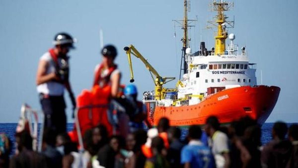Tunisia allows boat with migrants to dock after leaving it stranded for two weeks