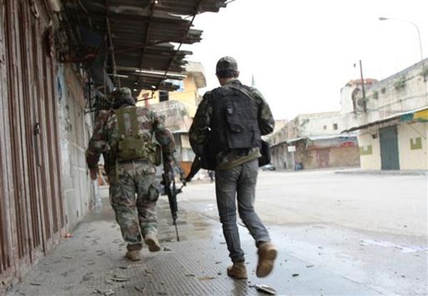 الجيش ينكفئ... وطرابلس تسقط في المجهول