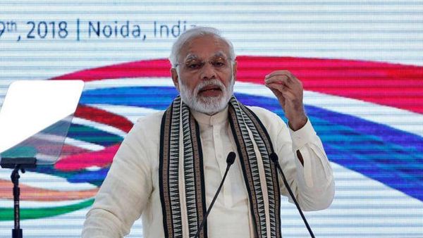 Indian opposition leader Gandhi startles bitter foe Modi with a hug