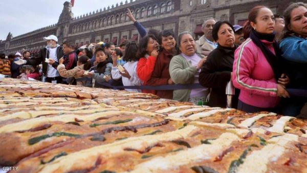 بالوزن والطول.. كعكة 