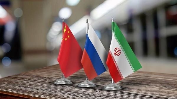 بيان إيراني روسي صيني: حل الملف النووي يستوجب وقف الهجمات والتهديد بها