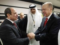 السيسي وأردوغان يتصافحان على هامش افتتاح مونديال قطر