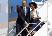  بالصور.. أوباما ينقذ ميشيل من موقف محرج بسبب 
